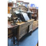 AN OAK MIRROR BACK SIDEBOARD