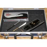 A METAL CASE, to include two Pilot Super 150L FNOS/FN22 advertising pens with 14K gold nibs (