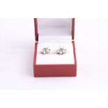 A PAIR OF PEARL CLUSTER EARRINGS, within the shape of flowers, stamped 9ct