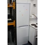 AN INDESIT FRIDGE FREEZER