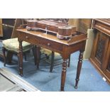 A LATE VICTORIAN MAHOGANY WRITING TABLE, with gallery back and two drawers