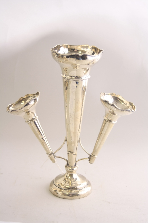 A SILVER WEIGHTED EPERGNE, with central fixed fluted vase flanked by two smaller removable vases,