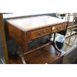 A MAHOGANY COFFEE TABLE, with drop leaf top and two drawers (sd)