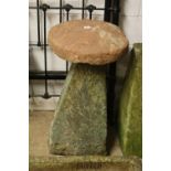 A STADDLE STONE ON A SQUARE TAPERED BASE, approximate height 94cm