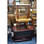 A TEAK NEST OF THREE TABLES, teak tile top nest of three tables and a TV stand (3)