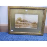 TWO 19TH CENTURY GILT FRAMED WATERCOLOURS, thatched cottages on country lanes, approximately 14.