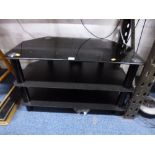 A GLASS THREE TIER TV STAND