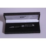 A BOXED BALL POINT PEN