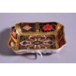 A ROYAL CROWN DERBY IMARI TRINKET DISH, '1128' pattern, gold banded, length approximately 9.5cm