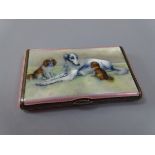 A SILVER AND ENAMEL CARD CASE, the hinged lid having shell thumb piece to enamelled Lurcher and