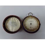 A TRAVEL COMPENSATED ANEROID BAROMETER, the dial inscribed Newton & co 3 Fleet St Temple Bar London,