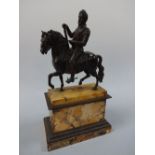 A BRONZE PATINATED FIGURE GROUP, soldier in armour sat atop horse, mounted on stepped marble plinth,