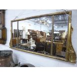 A GILT FRAMED OVERMANTLE/WALL MIRROR, approximate size width 97cm x height 46cm