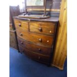 A VICTORIAN MAHOGANY BOW FRONT CHEST, of two short and three long drawers (key)