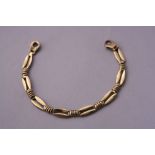 A 9CT GOLD BRACELET, with fancy links, hallmarks for London, weight approximately 9 grams, length