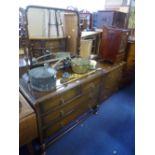 AN OAK DRESSING TABLE, with single mirror and a chest of three long drawers (2)