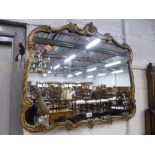 A GILT FRAMED WALL MIRROR, and three various other mirrors (4)