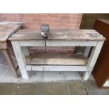 A PINE WORKSHOP BENCH, with an attached record vice, approximate size length 118cm x depth 40cm x