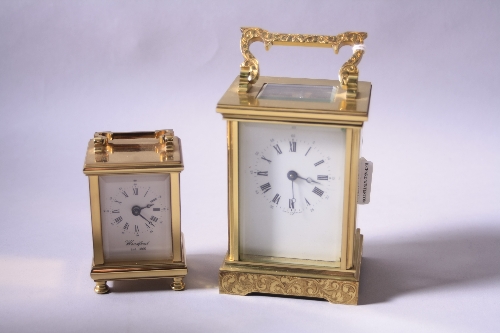 TWO CARRIAGE CLOCKS, the larger French example stamped 11 jewels verso