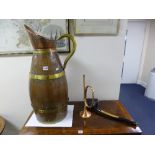 A LARGE OAK COOPERED JUG, with brass bands and handle and a copper pouring spout, approximate size