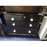 A STAINED PINE CHEST, of two short and two long drawers