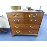 A 19TH CENTURY MAHOGANY CHEST, of two short and three long drawers, crossbanded top with reeded