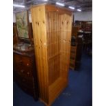 A TALL MODERN PINE OPEN BOOKCASE, approximate size: width 86cm, depth 33cm, height 187cm