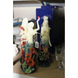 A SET OF FOUR BOXED TUPTON WARE FIGURES, 'Poppy', 'Poinsettia', 'Iris' and 'Lily' (4)