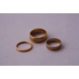 A 22CT GOLD BAND RING, an 18ct gold band ring and a 9ct gold band ring, ring sizes I, Q, J, total