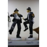 TWO NOVELTY 'BLUES BROTHERS' FIGURES, height approximately 45cm (2)