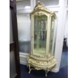 AN ITALIAN STYLE SINGLE DOOR DISPLAY CABINET, with two glass shelves on separate base with drawer,
