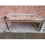 A LARGE PINE WORKSHOP BENCH, with an attached record vice, approximate size length 187cm x depth