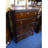 A TALL STAG CHEST, of four long and three short drawers (sd)
