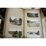 AN ALBUM CONTAINING VINTAGE POSTCARDS, animal and scenic interest