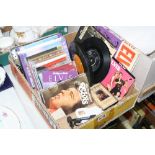 A TRAY OF ELVIS C.D'S, SINGLES, DVD'S AND VIDEO, including ten original singles