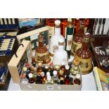 BELLS WADE WHISKY DECANTERS AND CONTENTS, miniatures etc