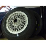 A PAIR OF VINTAGE 15' WIRE CAR WHEELS, fitted with 185R SR 15 tyres, (one tyre worn)