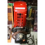 A BLACK BAKELITE TELEPHONE, with pull-out drawer, together with a model red telephone box, height