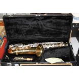 A CASED ADAM SAXOPHONE