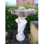 A LARGE COMPOSITE BIRD BATH, approximate height 76cm