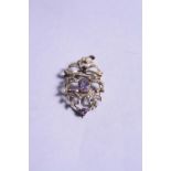 A 9CT EDWARDIAN AMETHYST AND SEED PEARL PENDANT, approximate weight 5.0 grams