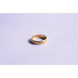 A 22CT WEDDING BAND, ring size K, approximate weight 4.4 grams