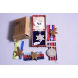 BOXED WWII GROUP OF FOUR MEDALS, attributed to a C J. Hyman of Portchester Nr Fareham, Hants 1939-45