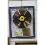 A LIMITED EDITION ELTON JOHN 'GOODBYE YELLOW BRICK ROAD' FRAMED GOLD DISC, with certificate verso