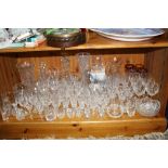 A QUANTITY OF CUT/ETCHED GLASSWARE, to include Waterford, Stuart etc (some boxed)