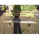 A CAST METAL PARK BENCH, with wooden slats, approximate size length 150cm x height 70cm x depth