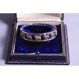 AN 18CT THREE TONED GOLD LION CHASED BRACELET, approximate weight 28.2 grams (boxed)