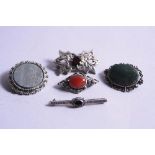 FIVE MIXED HARDSTONE BROOCHES