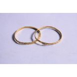 A PAIR OF GOLD BANGLES (stamped 916), approximate weight 25.5 grams