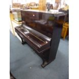 A LYNTON MAHOGANY CASED UPRIGHT PIANO